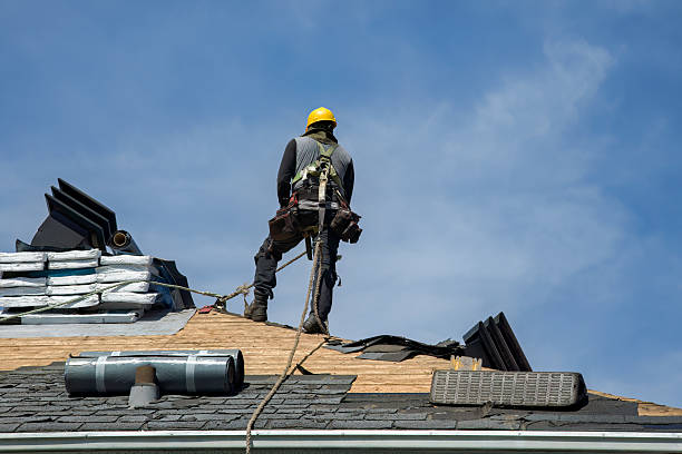 Professional Roof Replacement technician working in Whitehall, WI